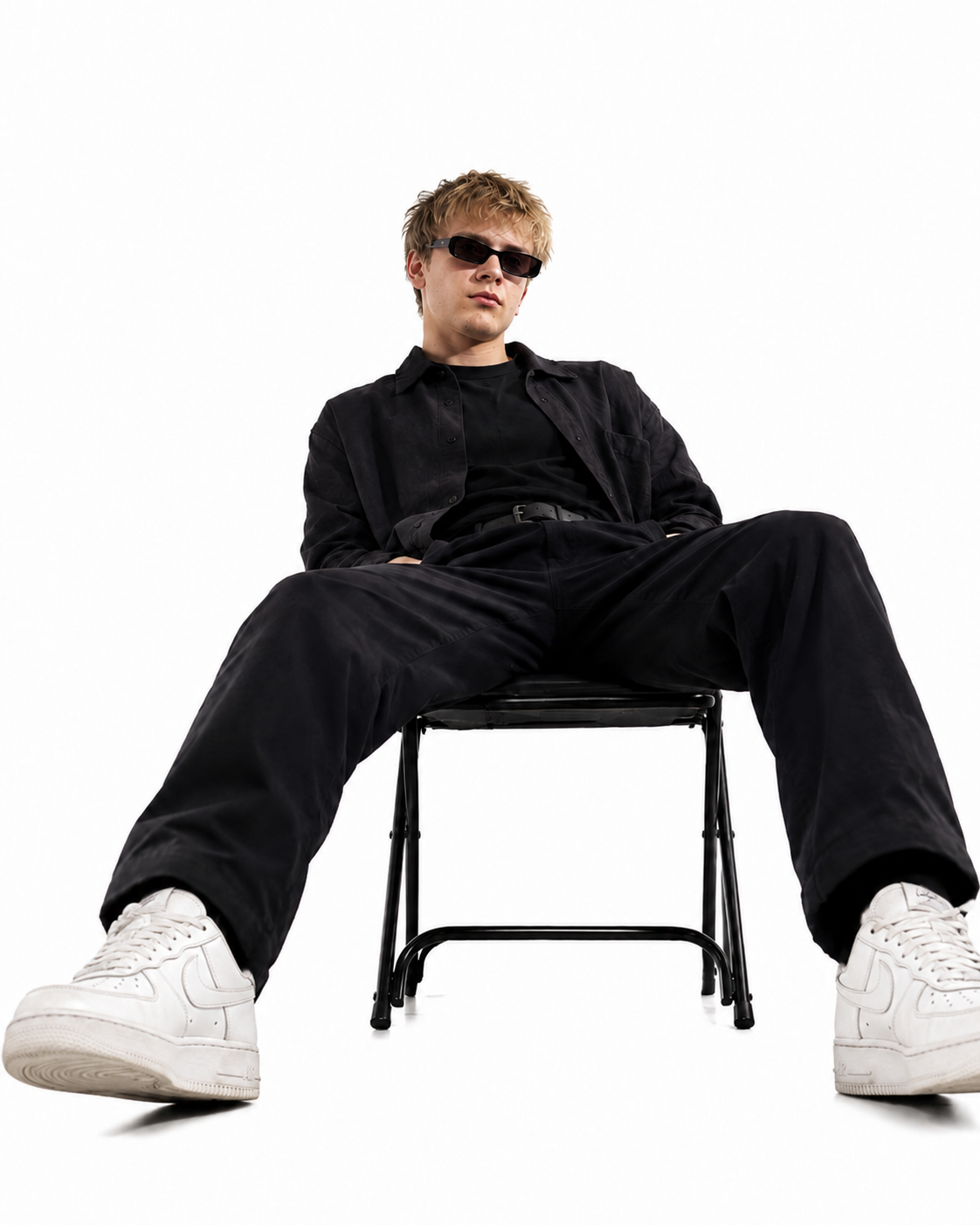 Petteri Helttula seated on a chair